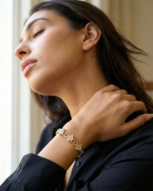 Maestra Fortuna 18k gold-plated clover bangle, lucky charm waterproof demi-fine jewelry staple.