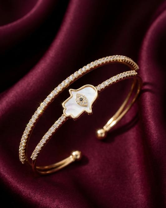 Maestra Asteria 18k gold-plated hamsa cuff bracelet, anti-tarnish symbolic jewelry for stacking.