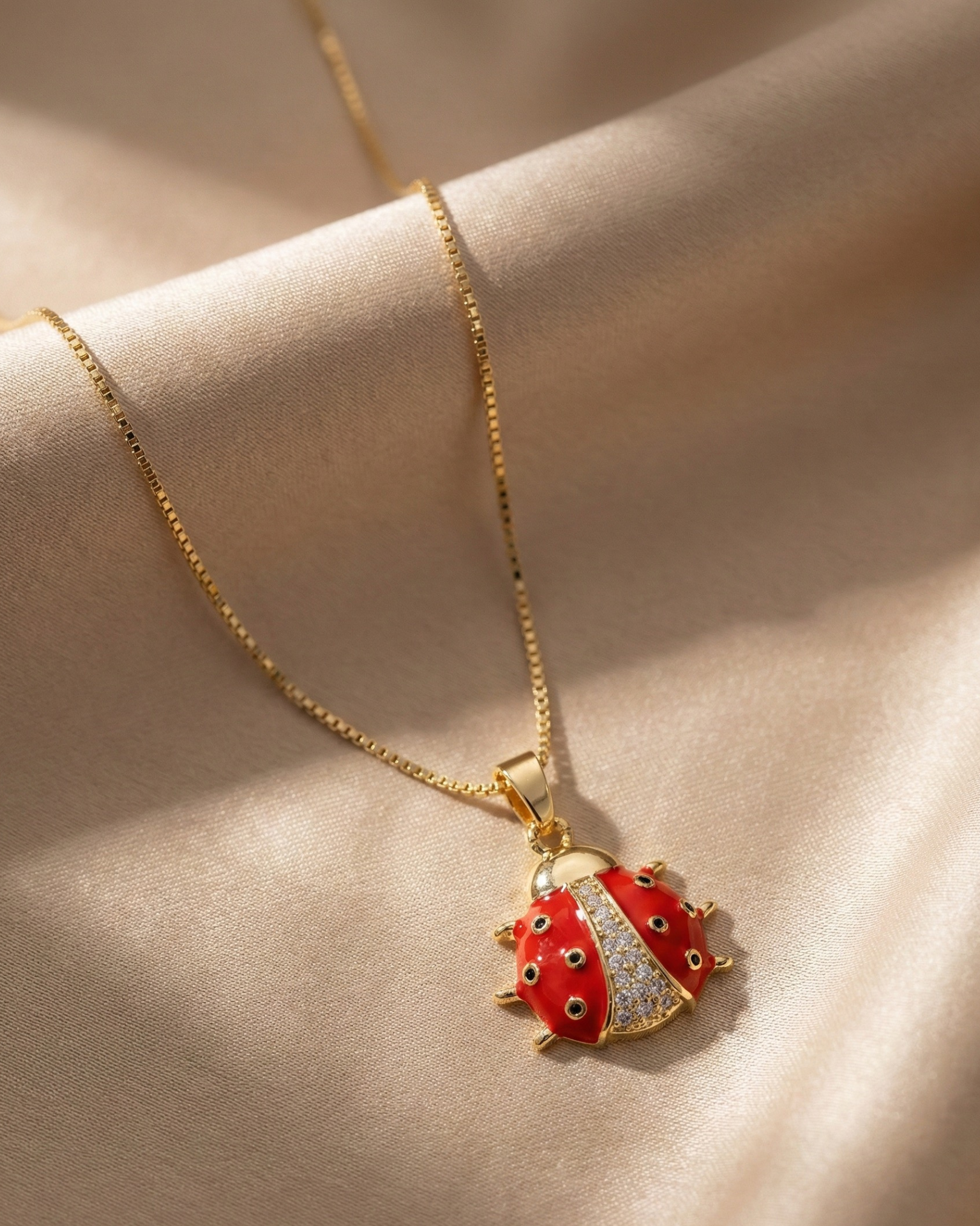 Maestra Beatrix 18k gold-plated ladybug charm necklace, red enamel ladybug jewelry, waterproof and life-proof.