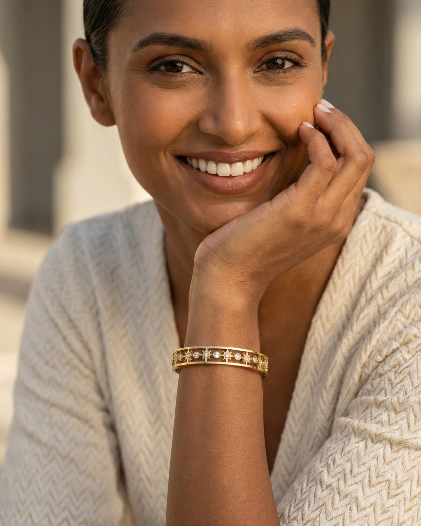 Maestra Celestial Starburst 18k gold-plated bangle, radiant star motif waterproof jewelry for daily glow.