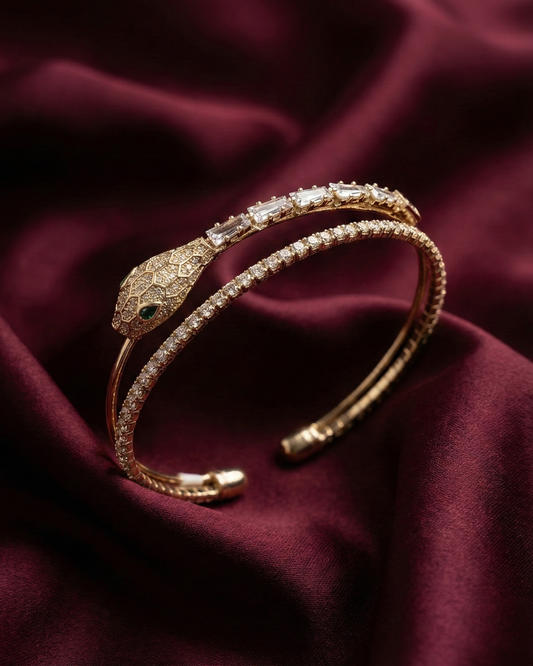 Maestra Cleo 18k gold-plated radiant serpent cuff, luxury snake-motif waterproof jewelry for women.
