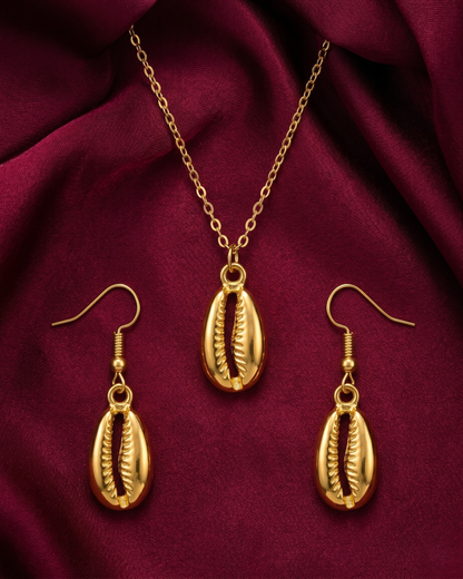 Gold plated cowrie necklace and earrings set for women. 3 piece matching ridged fan shell jewelry combo India. Lightweight office wear necklace and earring sets for working women. Textured sea shell pendant and fish hook drop earrings alloy. Diwali, Navratri, and Rakhi jewelry gifts for wives. Gold tone festive neck and ear accessories for girls, women, and friends