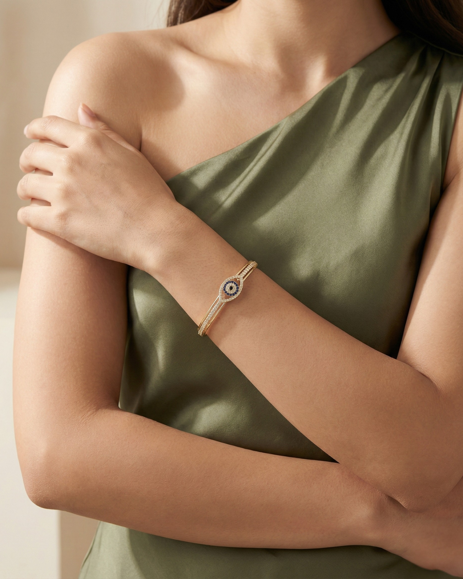 Maestra Cyanne 18k gold-plated evil eye cuff, blue stone protection jewelry, waterproof and sweat-proof.