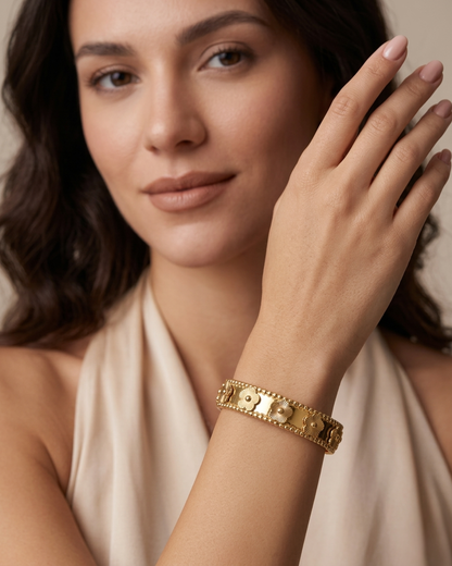 Maestra Flora Radiant Bloom 18k gold-plated floral bangle, feminine anti-tarnish jewelry for spring styling.