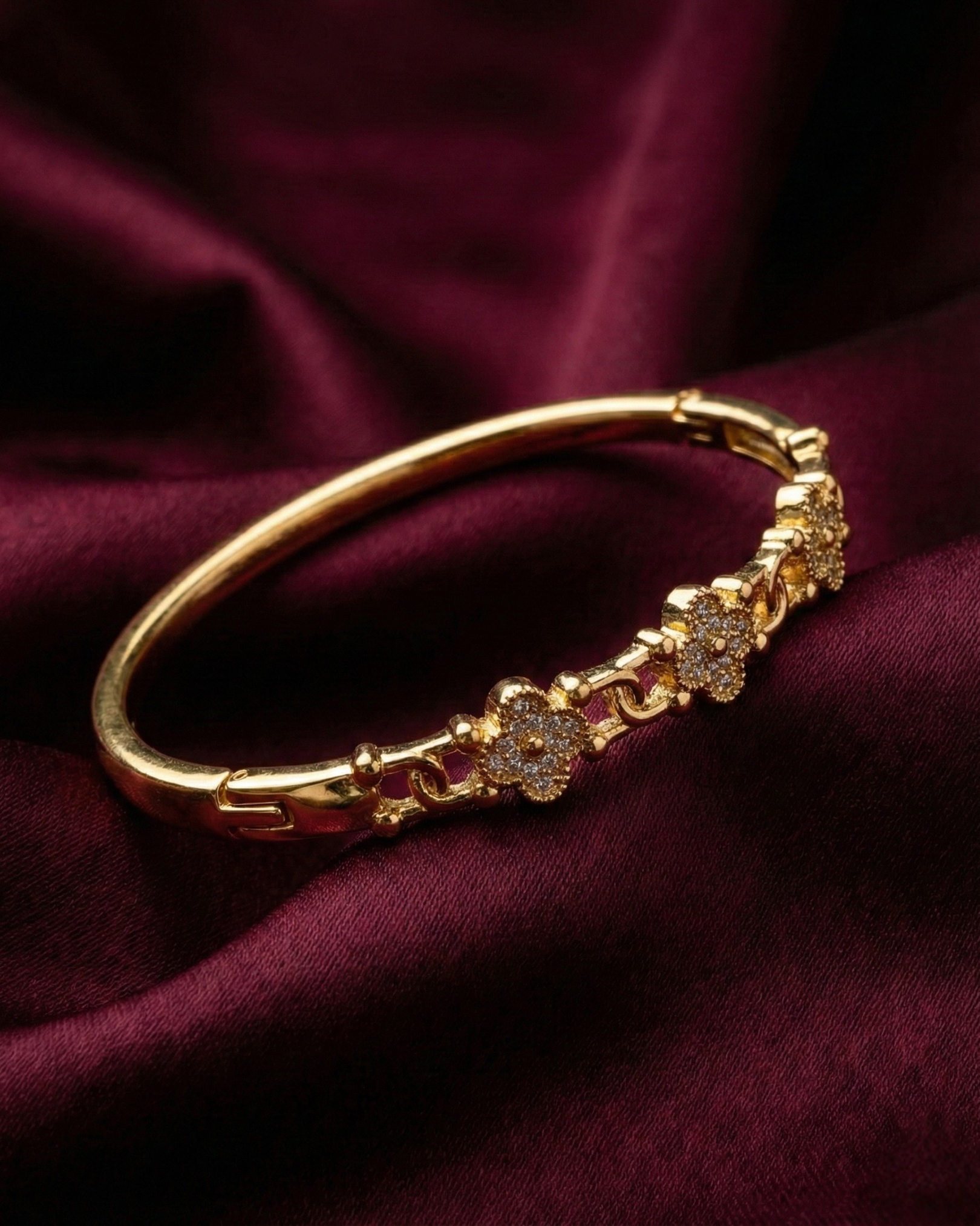 Maestra Fortuna 18k gold-plated clover bangle, lucky charm waterproof demi-fine jewelry staple.