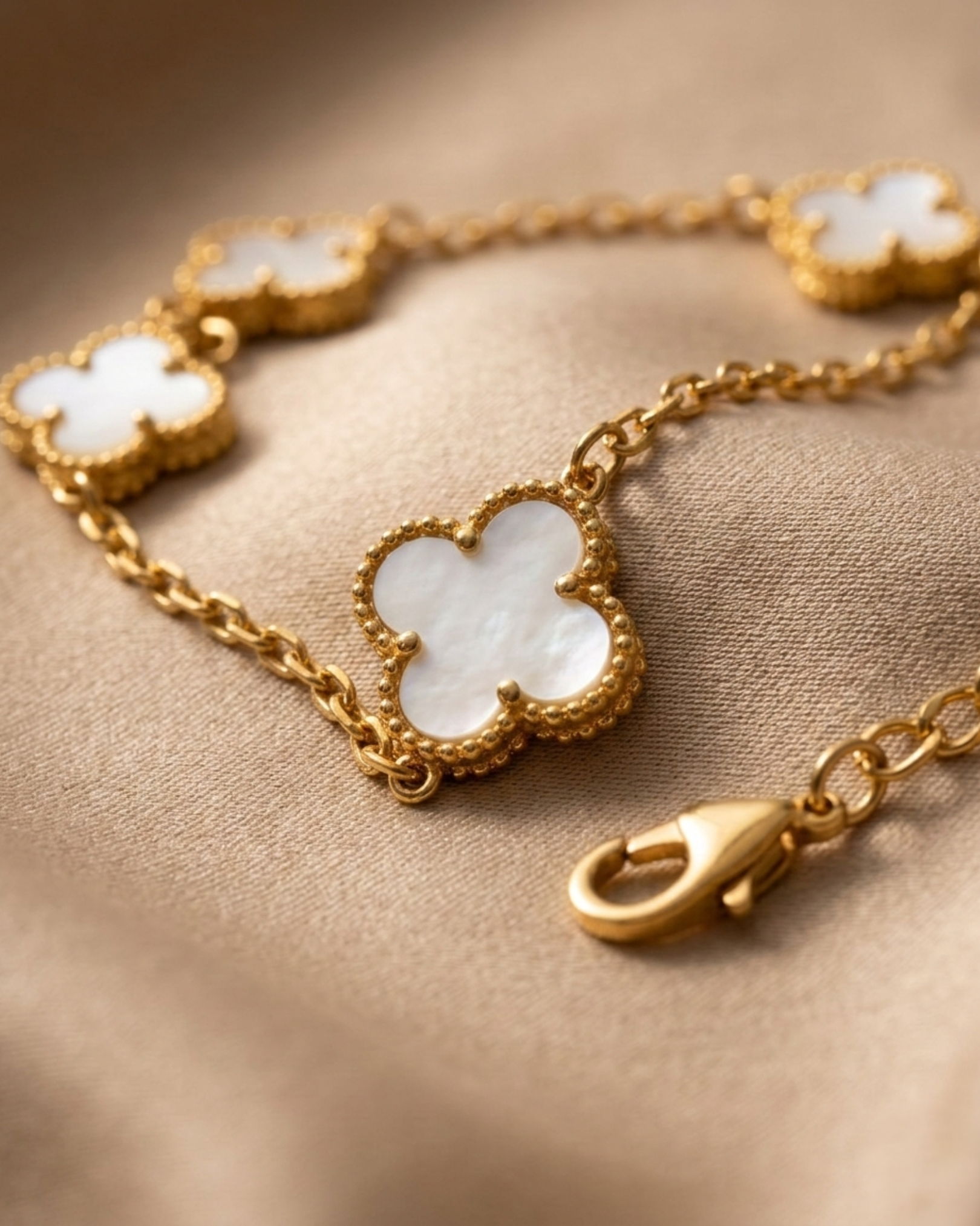 Maestra Hera white clover layered necklace stack, 18k gold-plated waterproof clover and laurel leaf chain set.