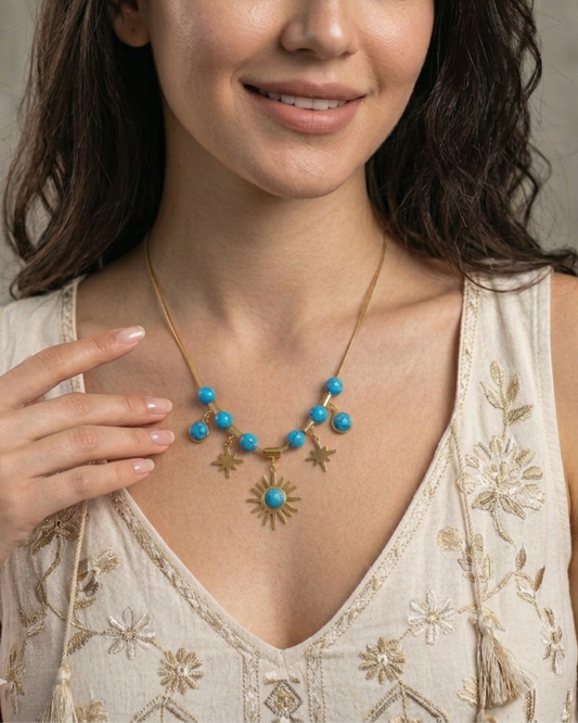 Maestra 18k gold-plated turquoise celestial charm necklace with moon and star, waterproof boho-luxe jewelry.