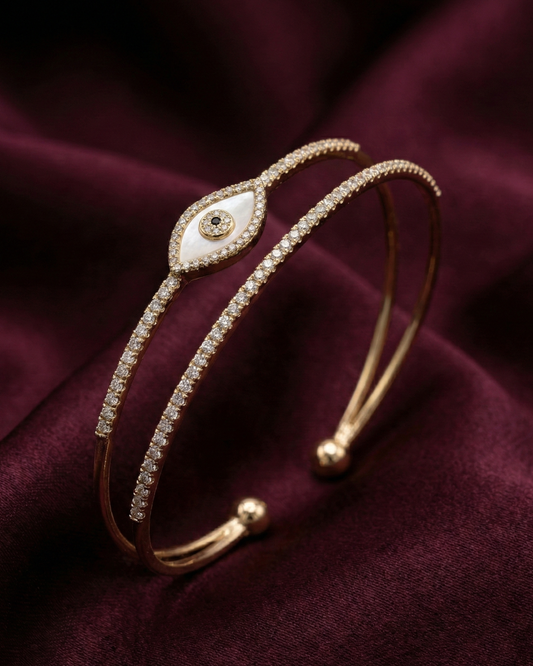 Maestra Irida 18k gold-plated evil eye cuff bracelet, modern protection jewelry, waterproof, and anti-tarnish.