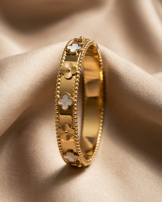 Maestra Lumina Bloom 18k gold-plated floral clover bangle, luxury demi-fine jewelry for women.