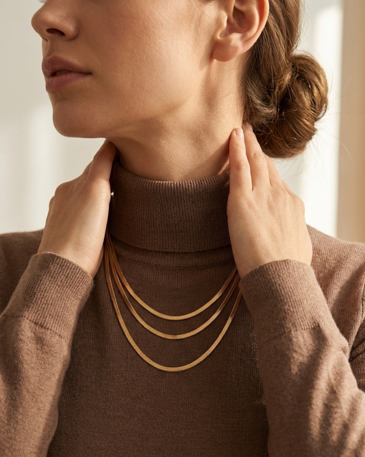 Maestra Trinity 18k gold-plated snake chain necklace, minimalist waterproof flat link chain for layering.