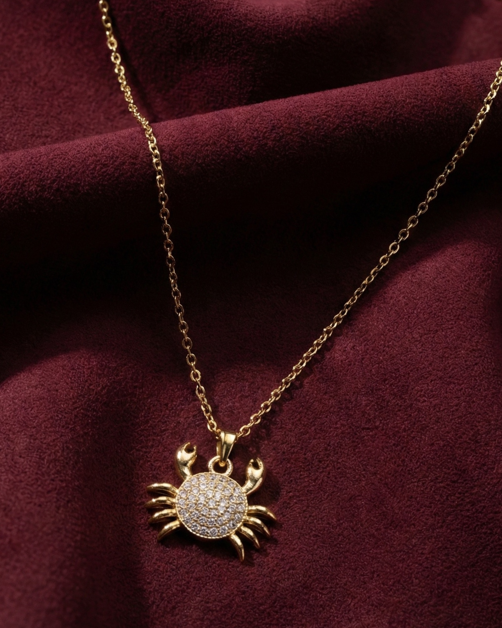 Maestra Caria 18k gold-plated crab pendant necklace, unique zodiac-inspired beach jewelry, waterproof and sweat-proof.