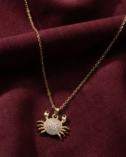 Maestra Caria 18k gold-plated crab pendant necklace, unique zodiac-inspired beach jewelry, waterproof and sweat-proof.