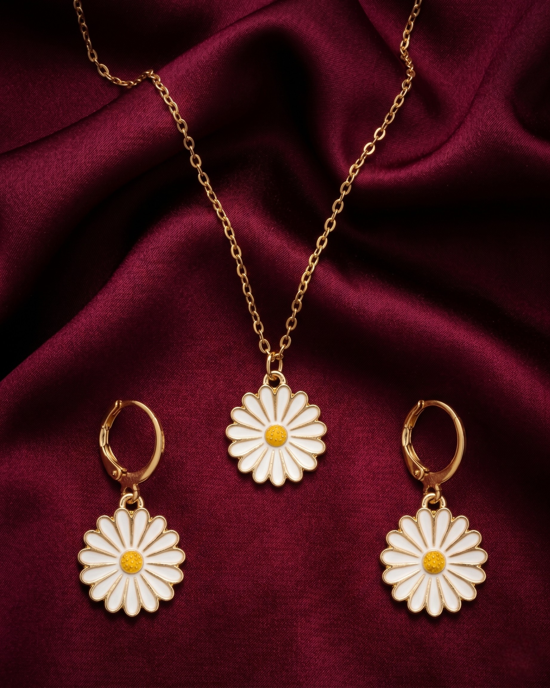 Gold plated daisy necklace and earrings set for women. 3 piece matching white flower charm jewelry combo India. Lightweight office wear necklace and earring sets for working women. White enamel floral pendant and drop earrings alloy. Diwali, Navratri, and Rakhi jewelry gifts for wives. Gold tone festive neck and ear accessories for girls, women, and friends.