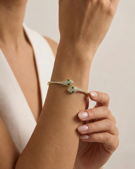 Maestra Medusa 18k gold-plated serpent cuff, bold animal-motif waterproof demi-fine jewelry.