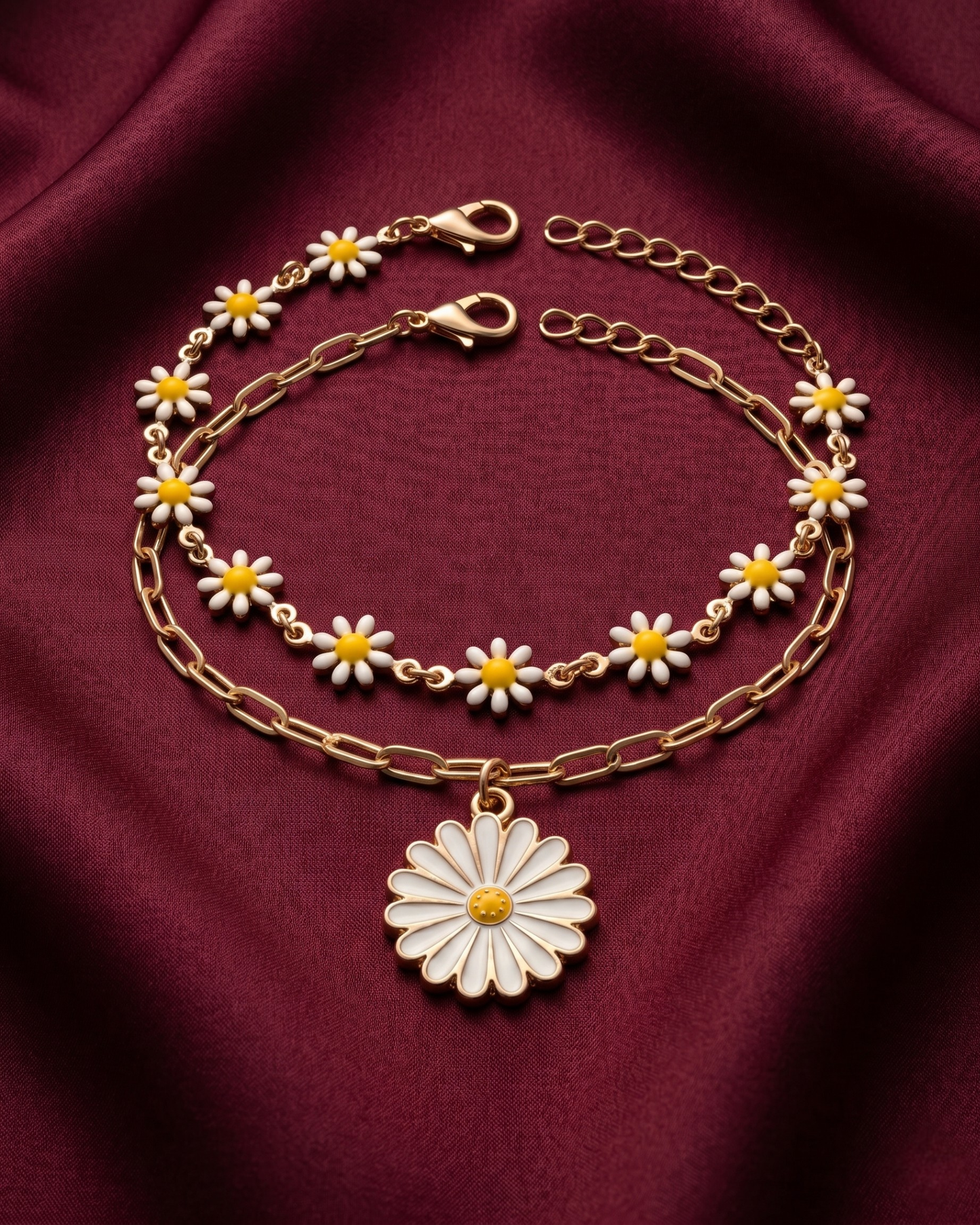 Gold plated daisy charm bracelet stack for women. 2 piece layered flower link bracelets India. Lightweight office wear jewelry for working women. Enamel daisy and paperclip chain bracelet set alloy. Diwali and Rakhi jewelry gifts for wives. Gold tone festive wrist accessories for girls and friends.