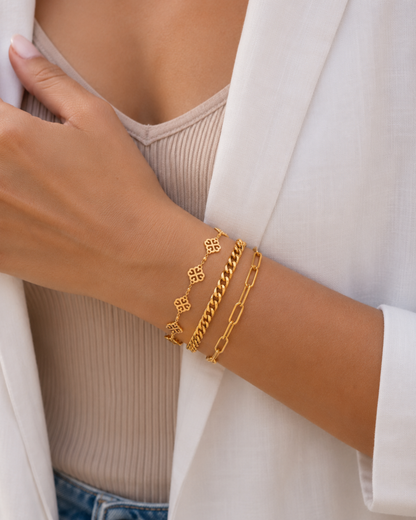 Gold plated chain bracelet stack for women. 3 piece layered link bracelets India. Lightweight office wear jewelry for working women. Paperclip and curb chain bracelet set alloy. Floral mandala motif jewelry for Indian festivals. Diwali and Rakhi jewelry gifts for wives and friends.
