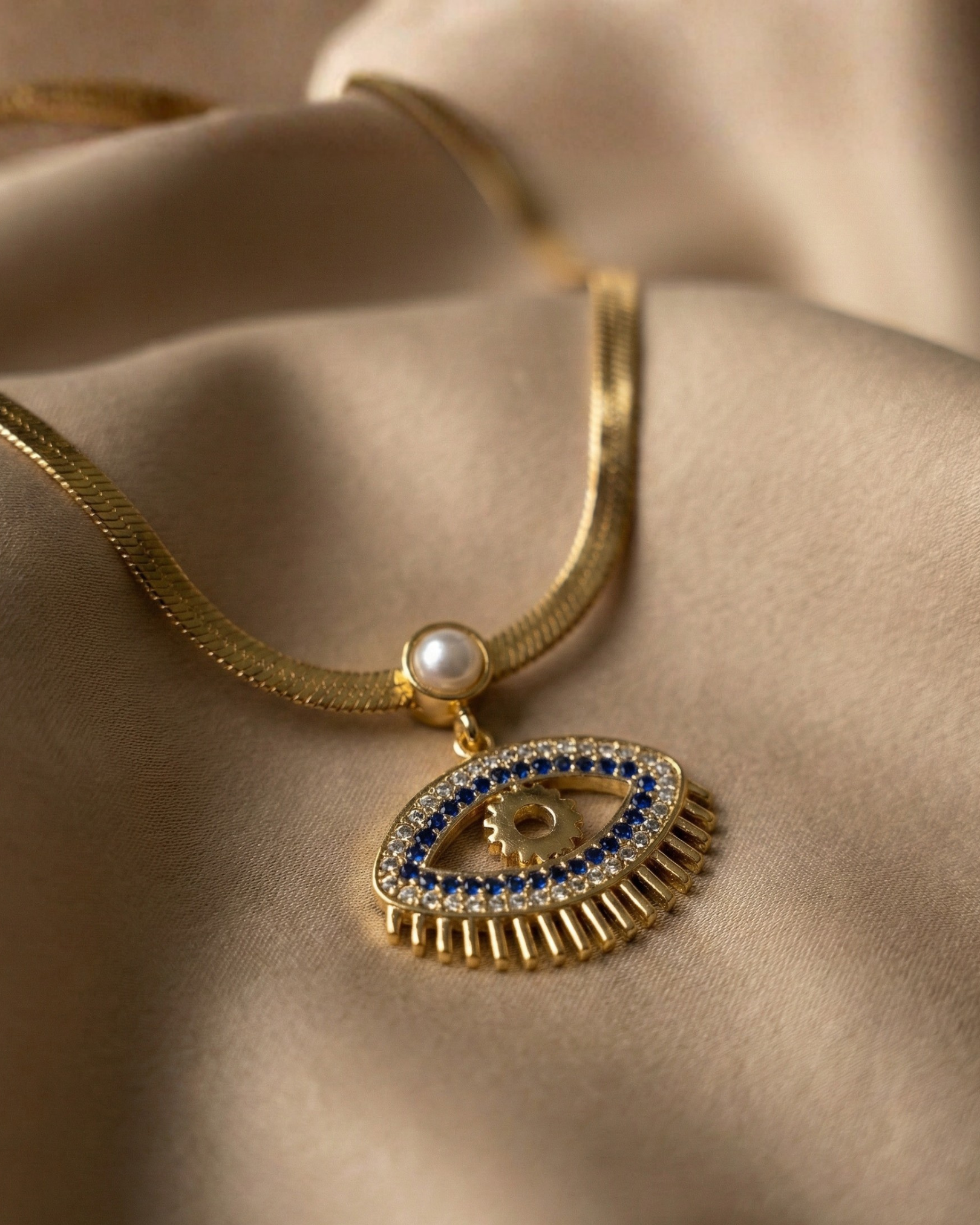 Maestra Selene demi-fine 18k gold-plated evil eye protection necklace for women, waterproof and hypoallergenic daily wear.