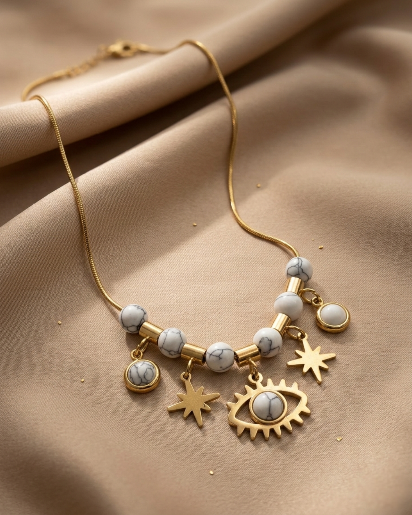 Maestra 18k gold-plated white evil eye charm necklace, protective waterproof jewelry for daily wear.