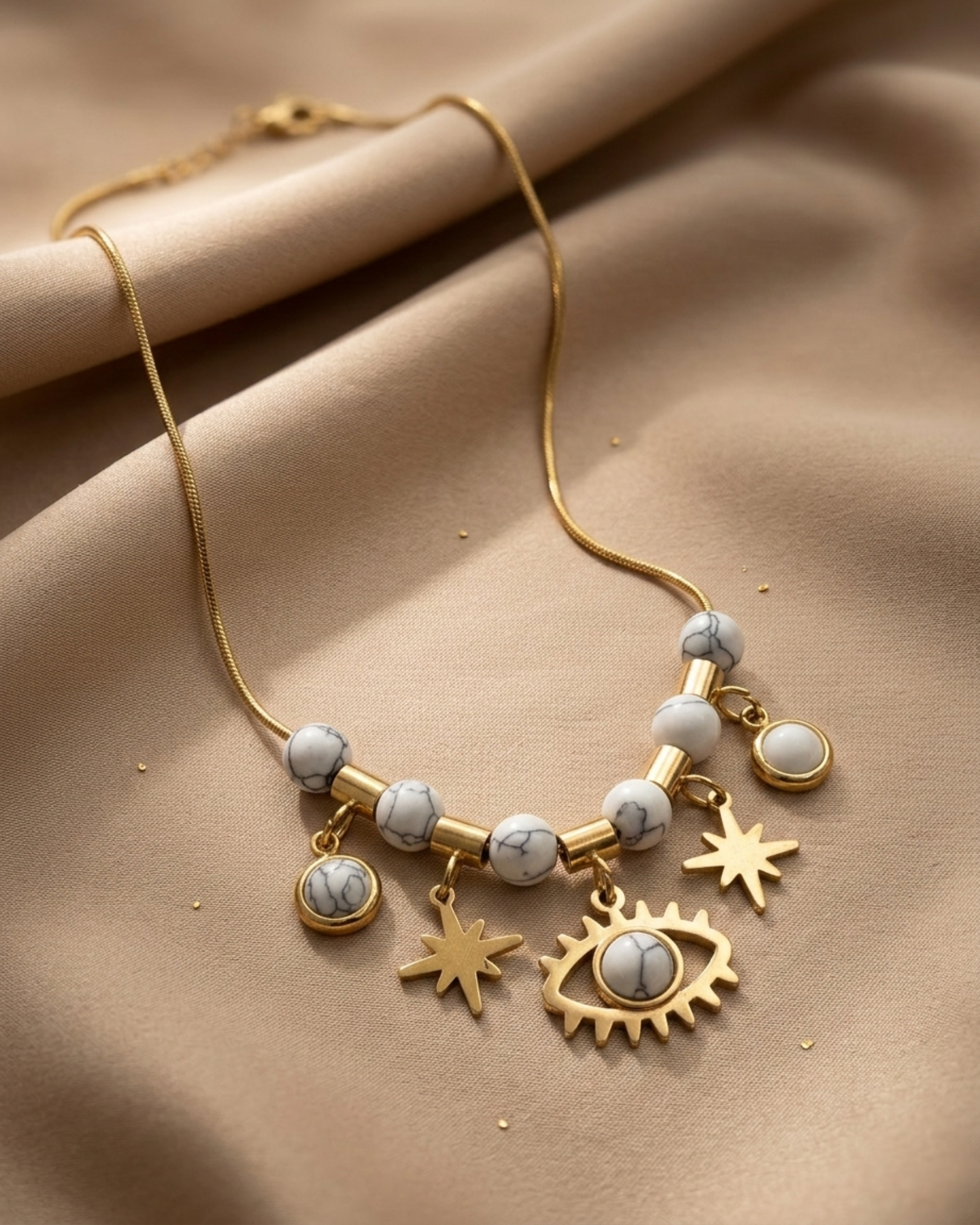Maestra 18k gold-plated white evil eye charm necklace, protective waterproof jewelry for daily wear.