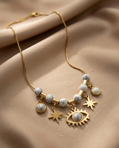 Maestra 18k gold-plated white evil eye charm necklace, protective waterproof jewelry for daily wear.